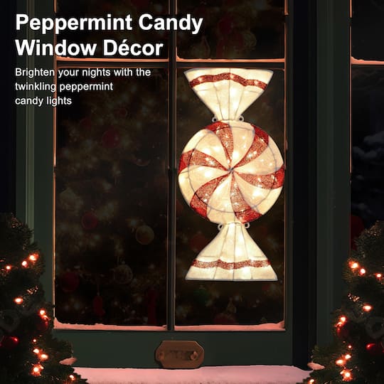 Puleo International 6ft. Pre-Lit Peppermint Candy Pathway Stake Christmas Décor with Warm White LED Lights